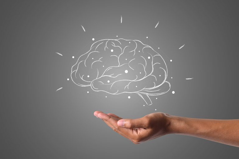 Brain floating over extended hand