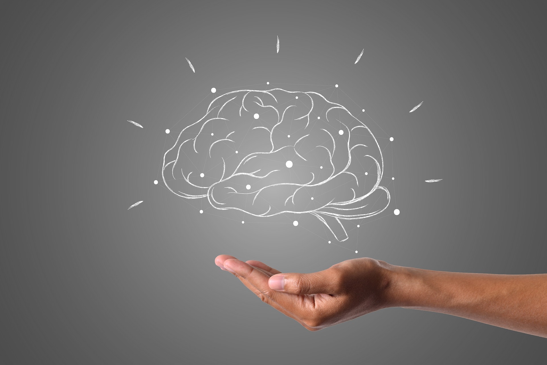 Brain floating over extended hand