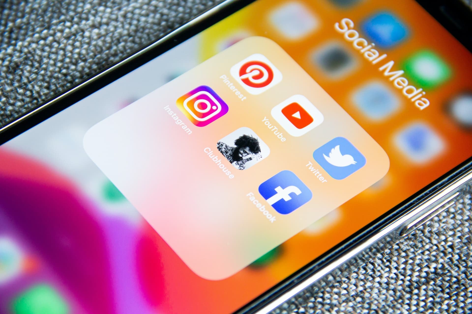 iPhone with social media icons