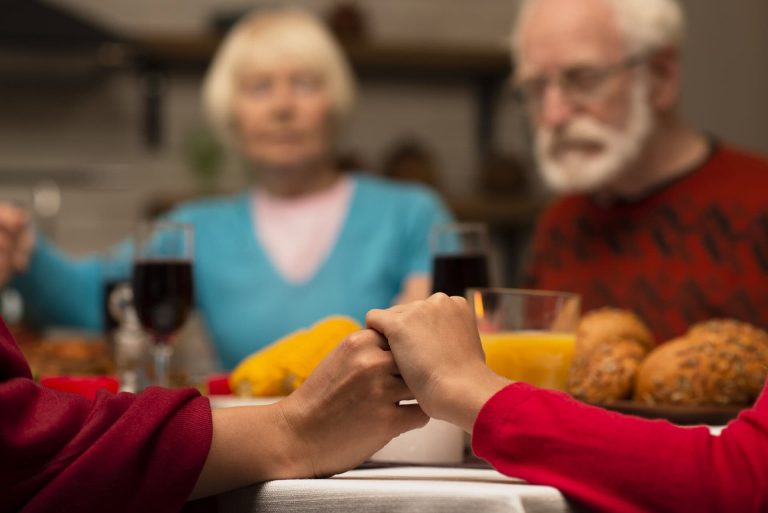 Elderly people around dinning table