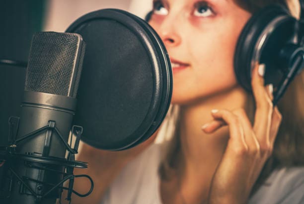 female talking in microphone